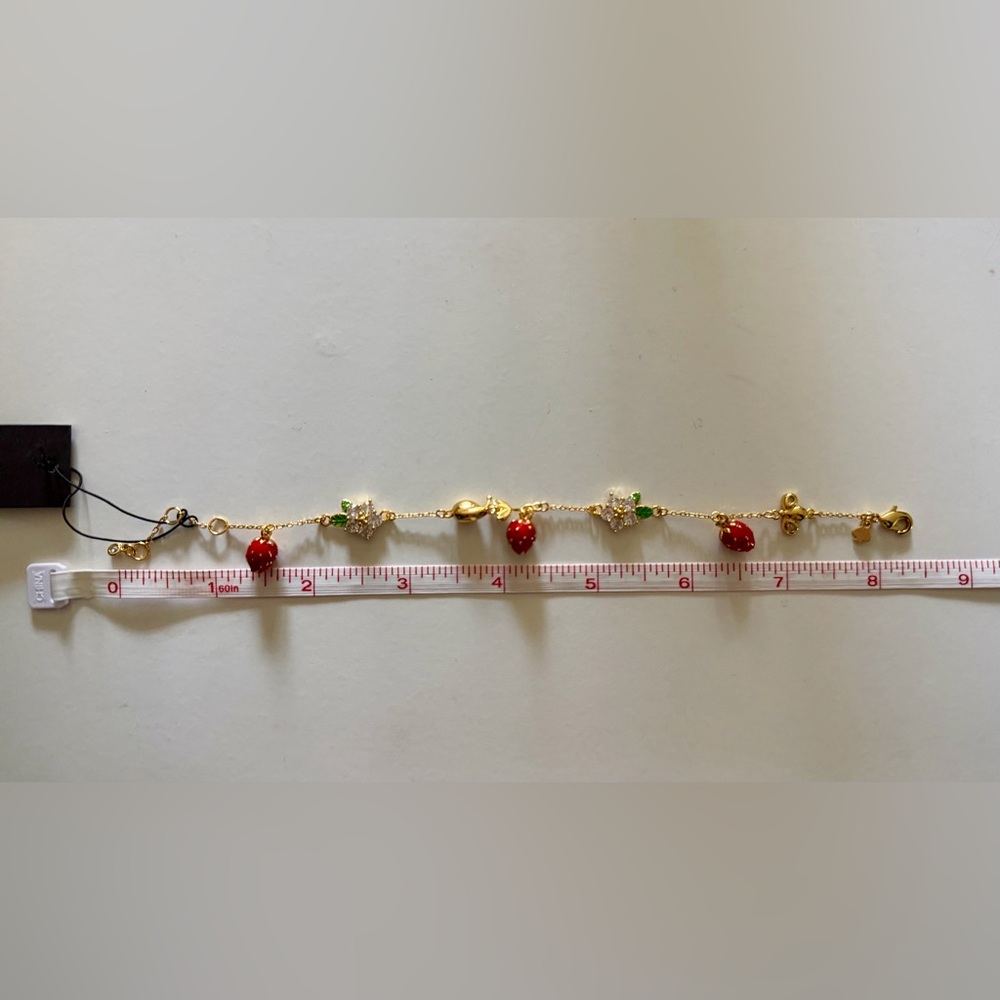 Kate Spade Gold Charm Bracelet - Picture 2 of 2